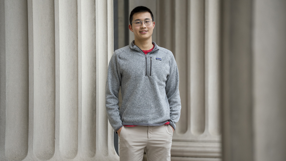 Alex Tang with MIT columns